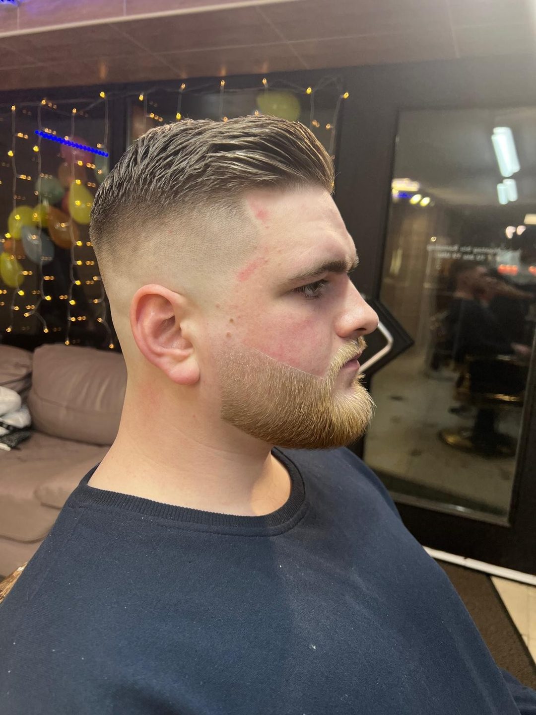 Slick Back mit High Fade
